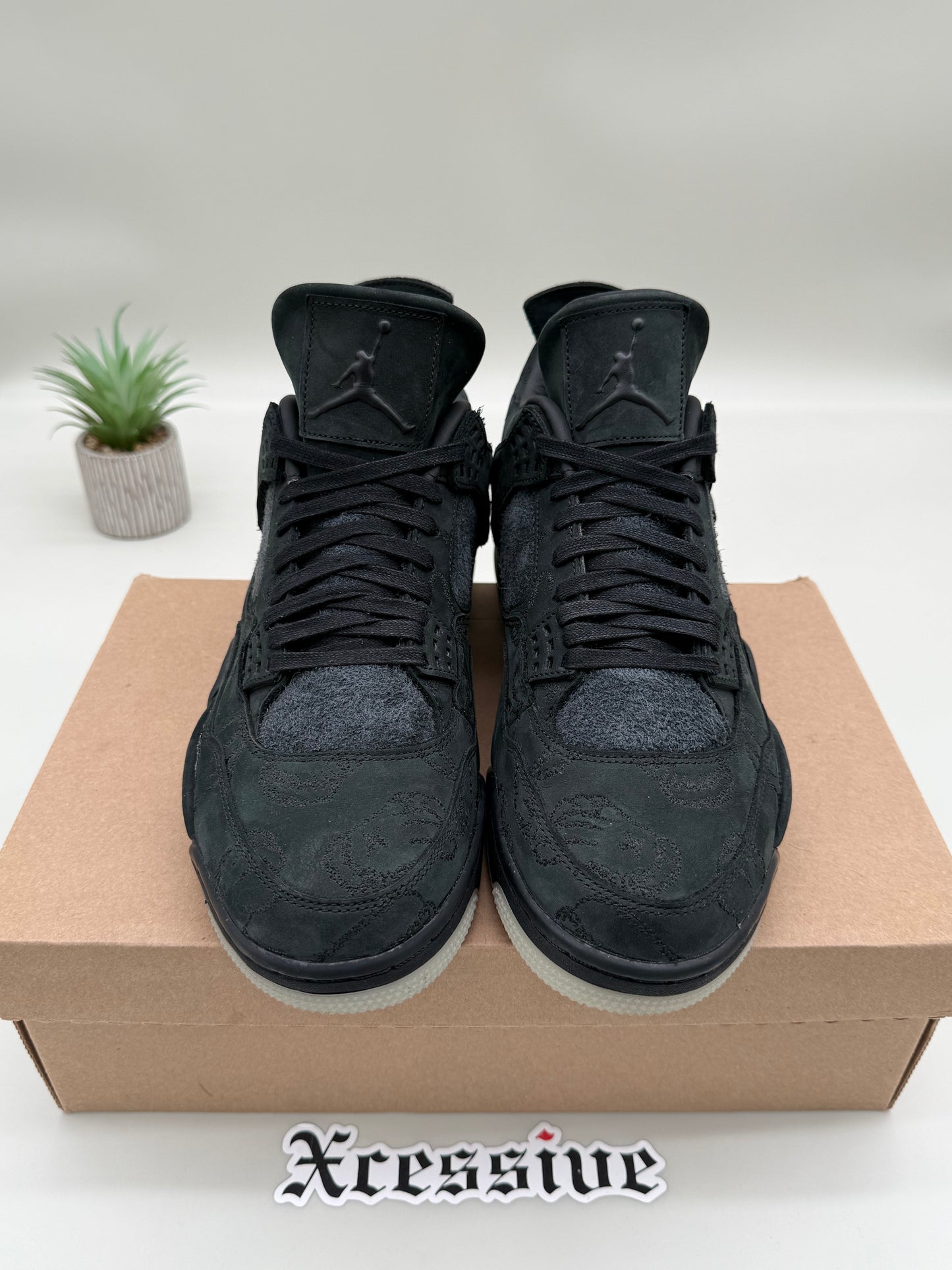 Jordan 4 KAWS Black