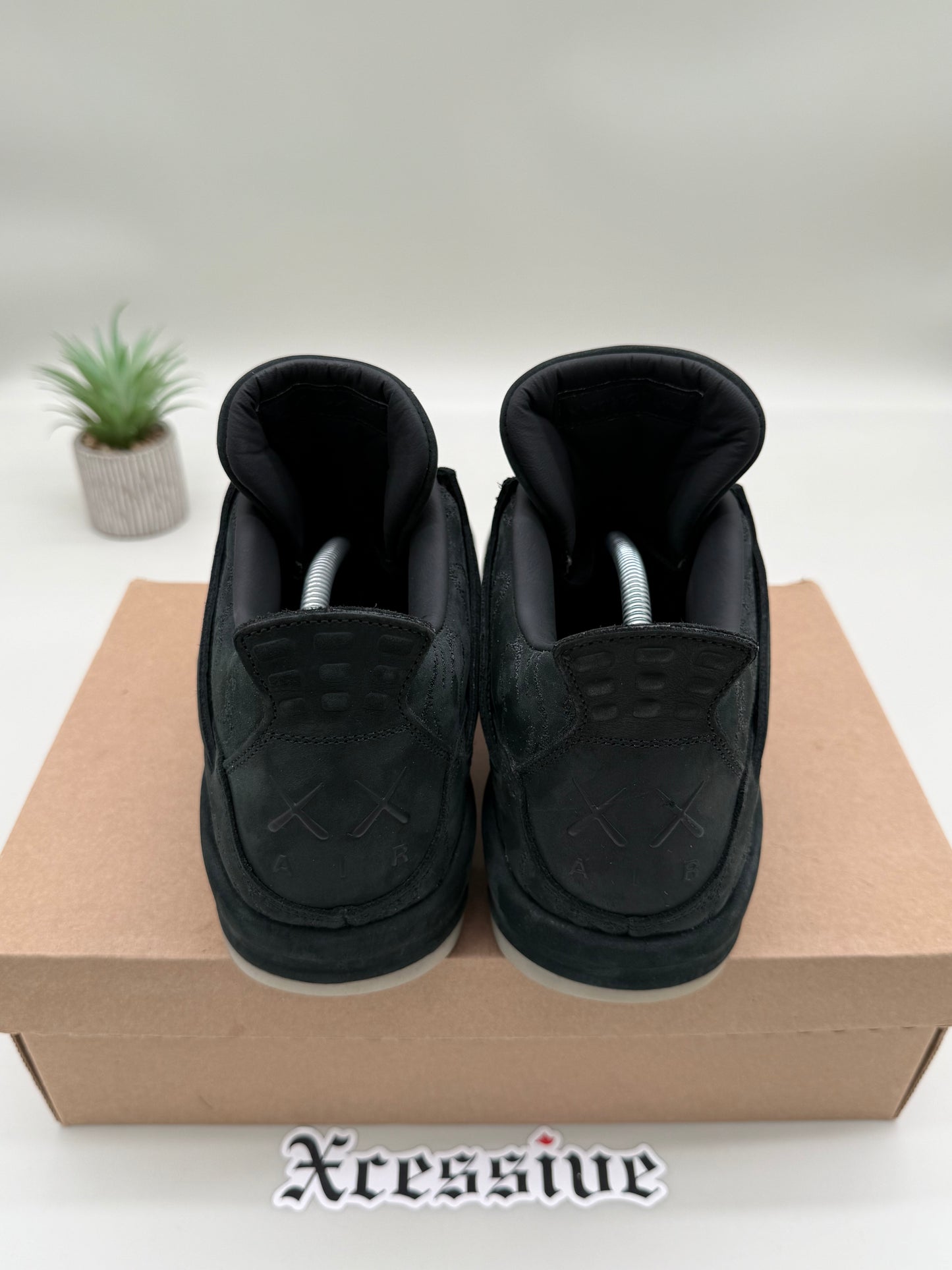 Jordan 4 KAWS Black