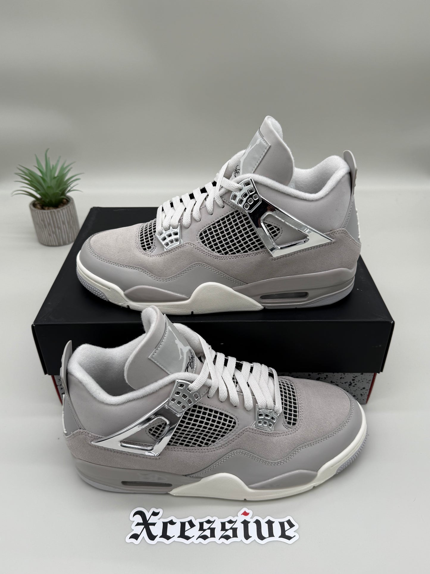 Jordan 4 Frozen Moments