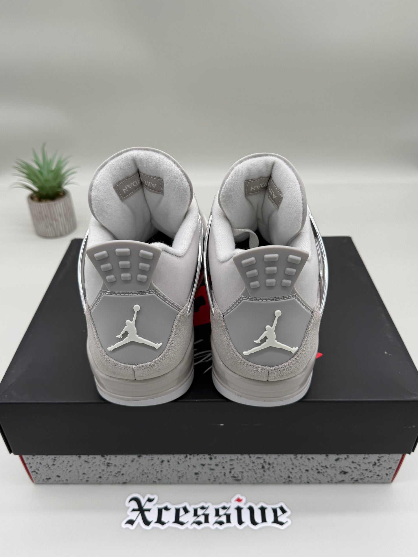 Jordan 4 Frozen Moments