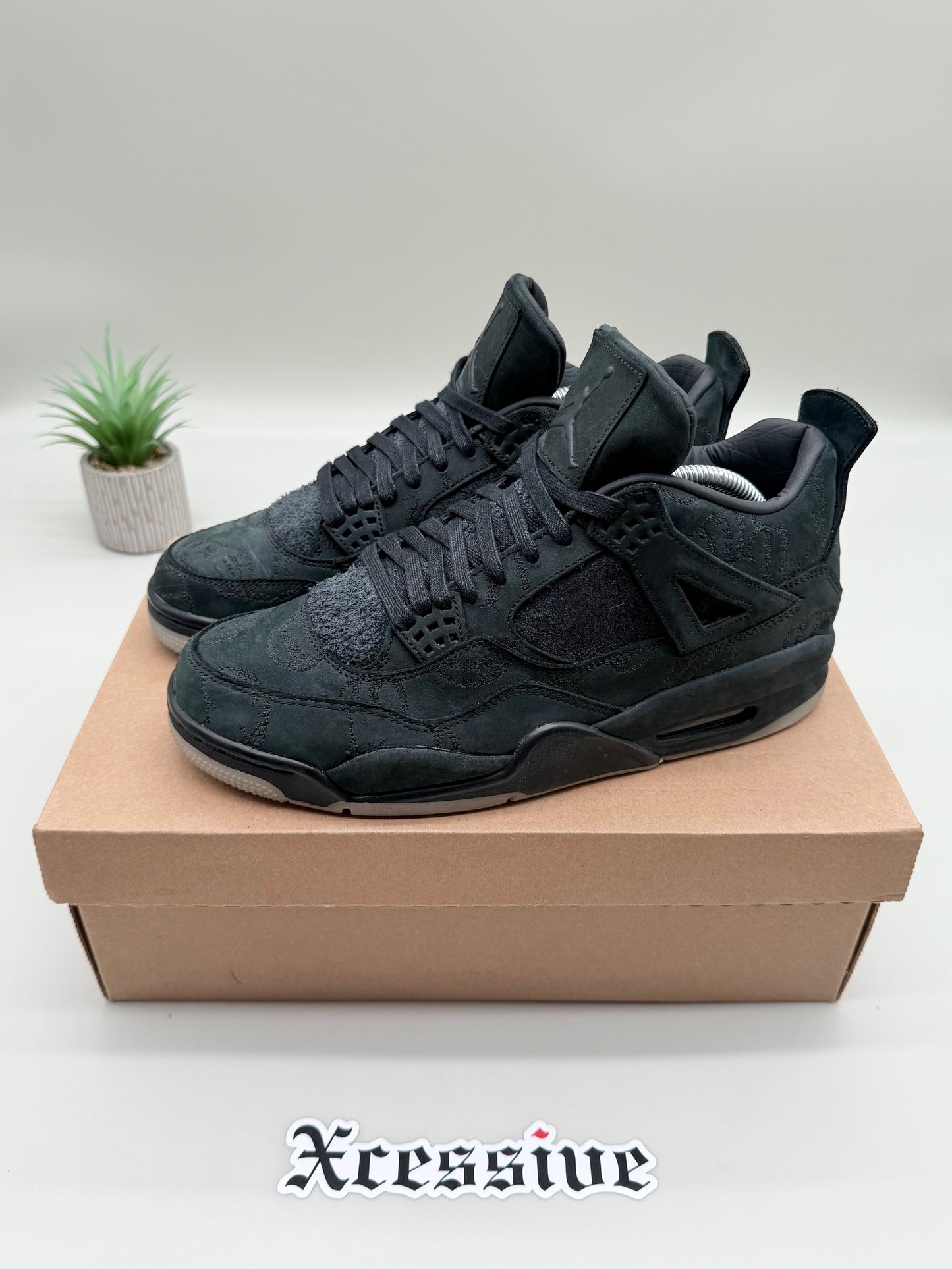 Jordan 4 KAWS Black