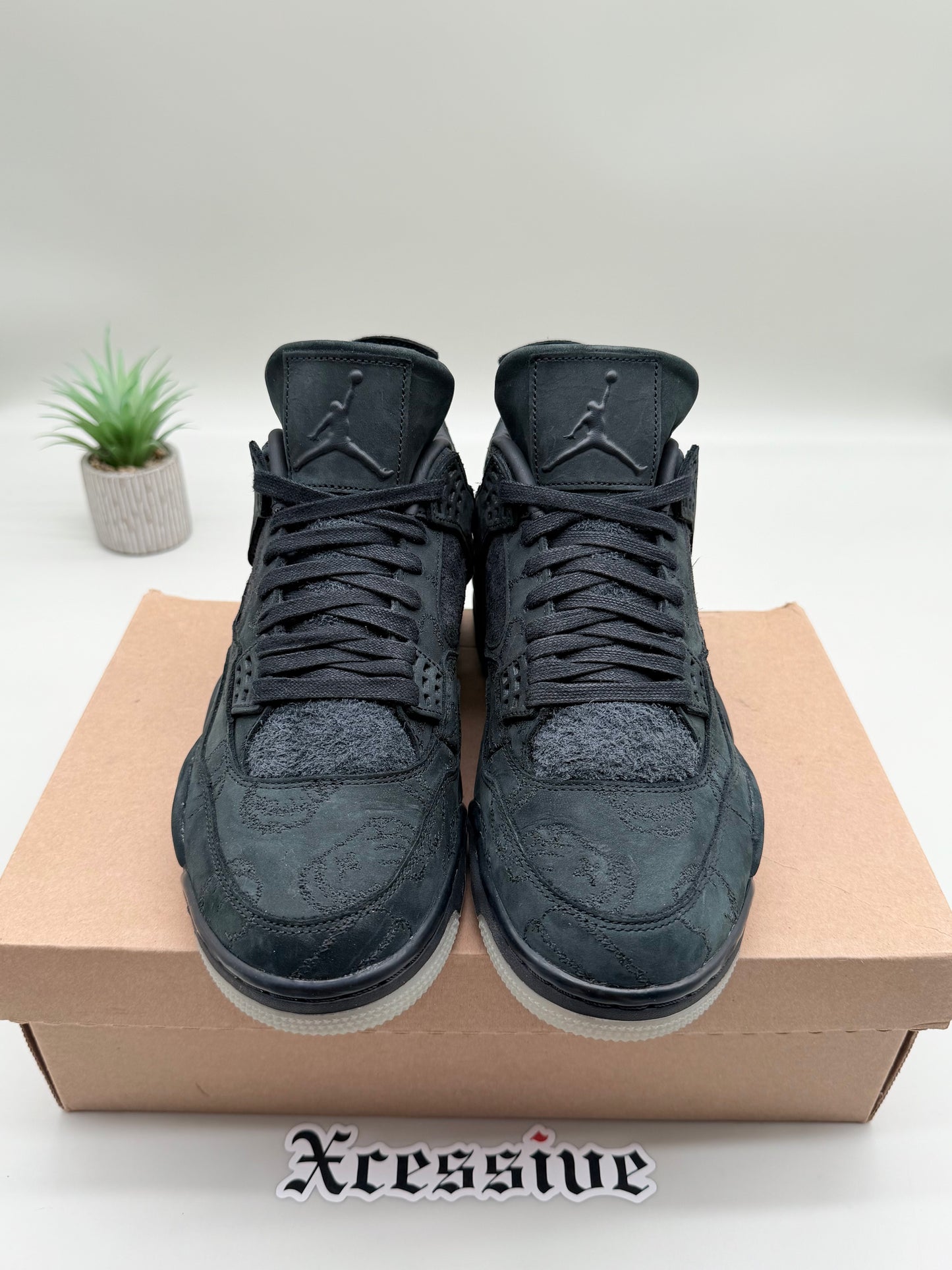 Jordan 4 KAWS Black