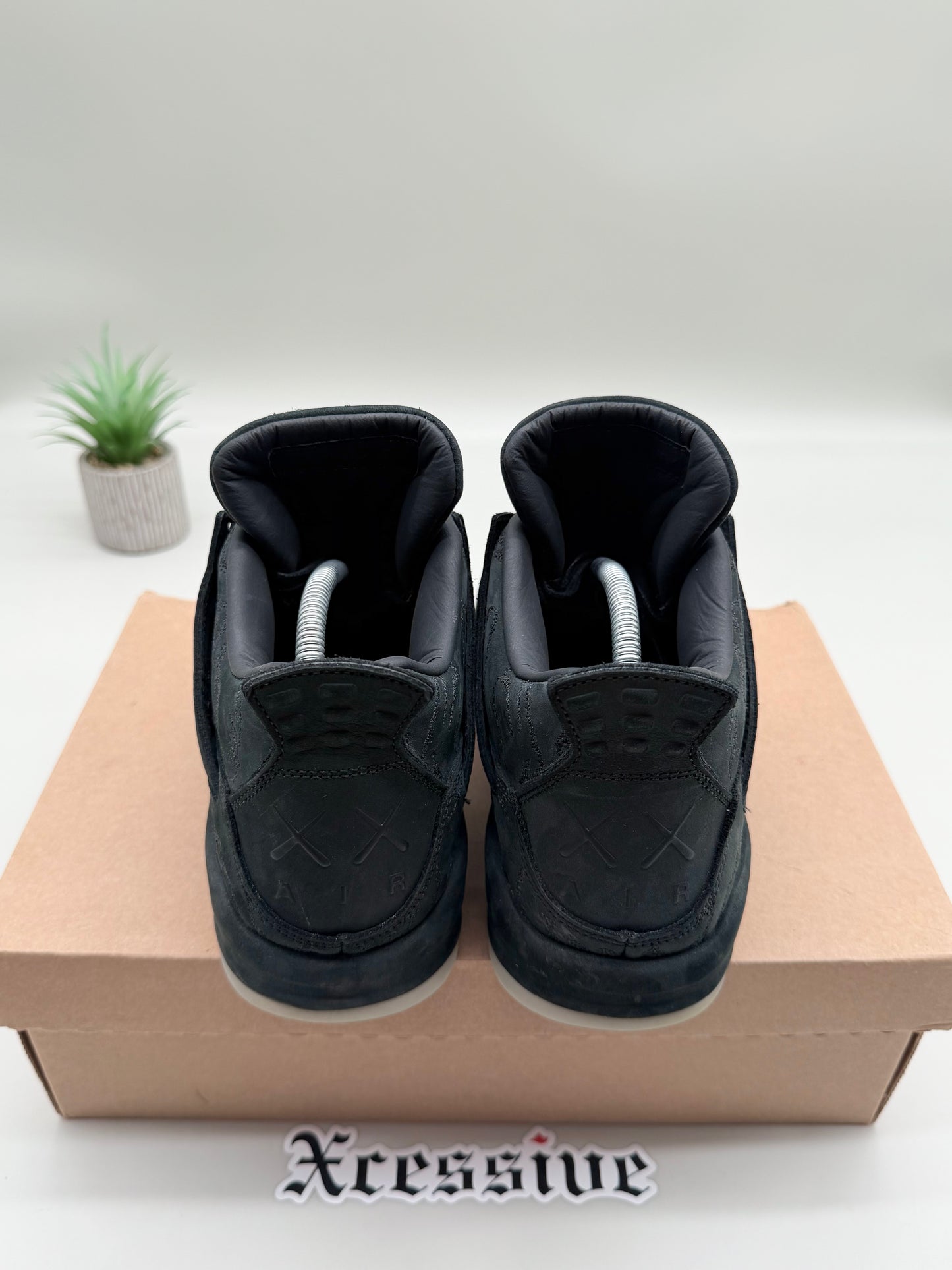 Jordan 4 KAWS Black