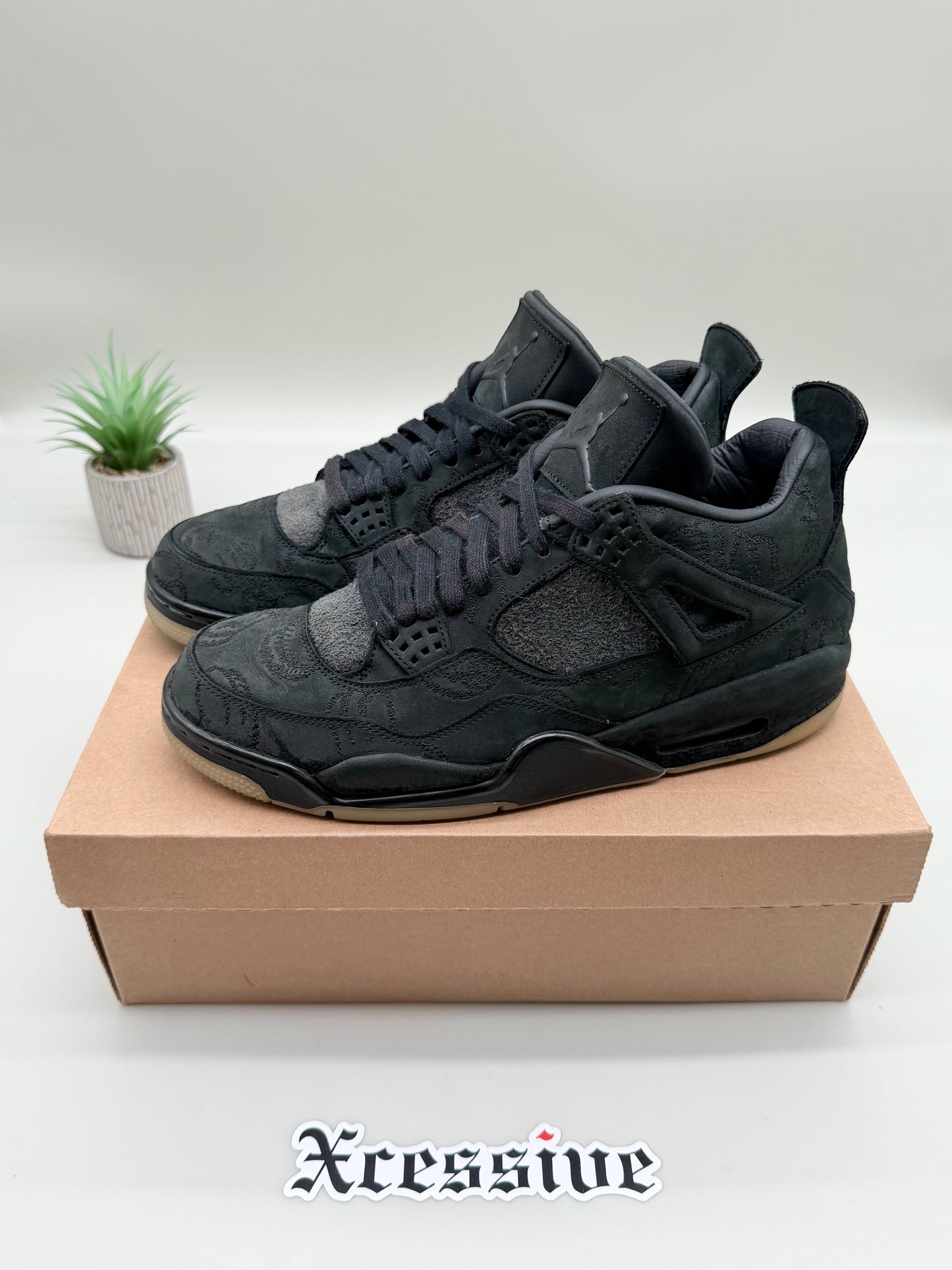 Jordan 4 KAWS Black