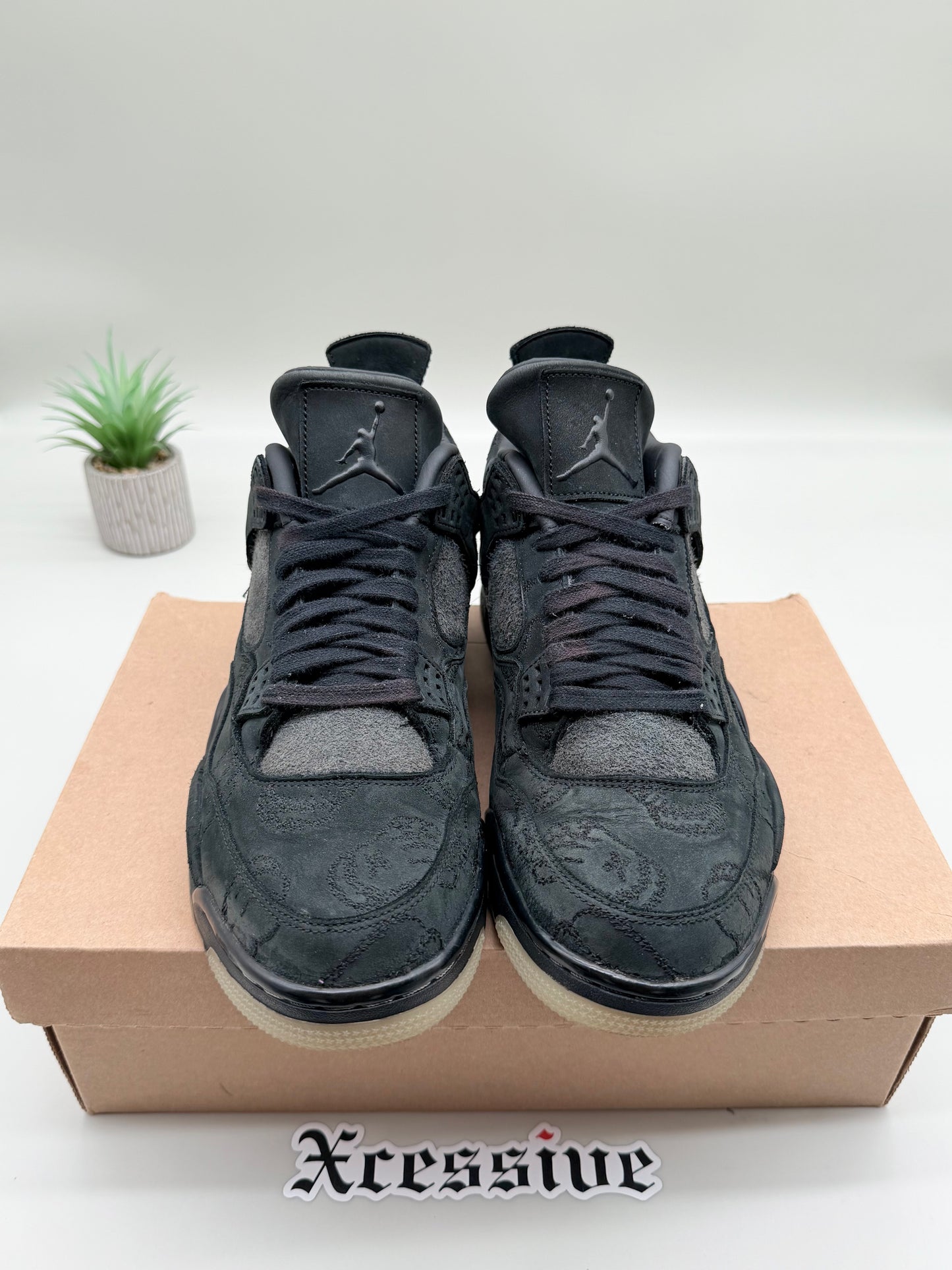 Jordan 4 KAWS Black