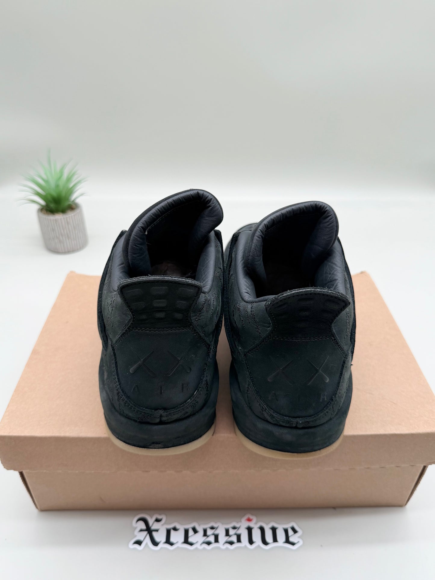 Jordan 4 KAWS Black