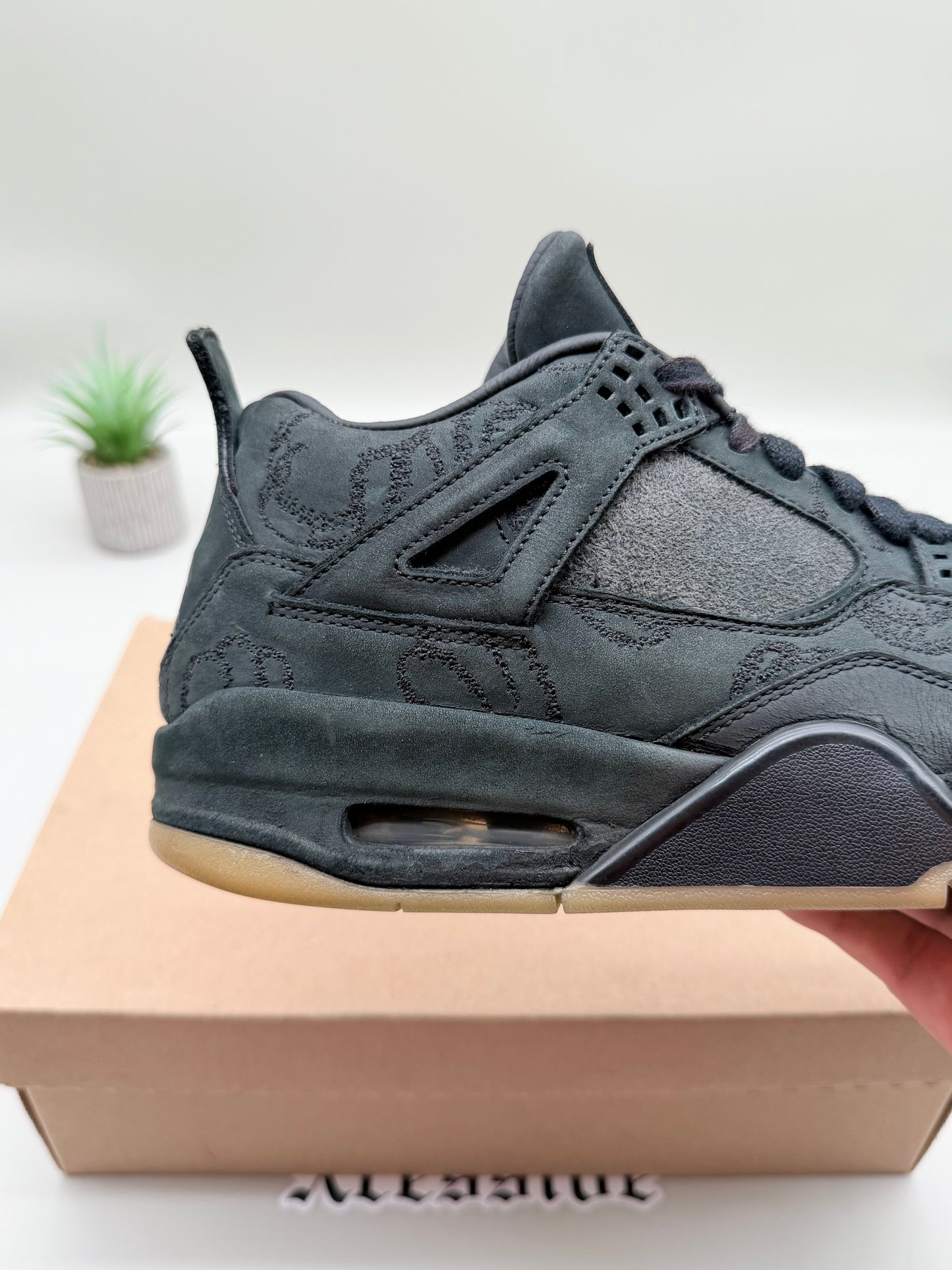 Jordan 4 KAWS Black
