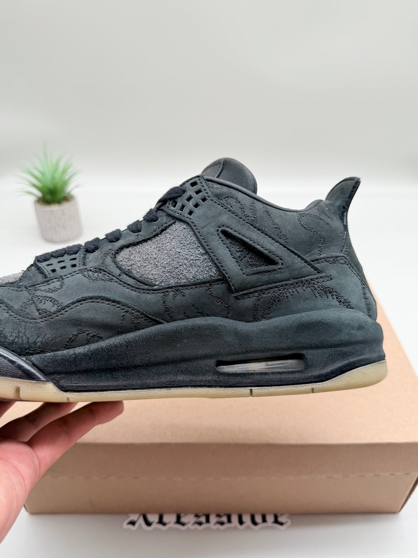 Jordan 4 KAWS Black