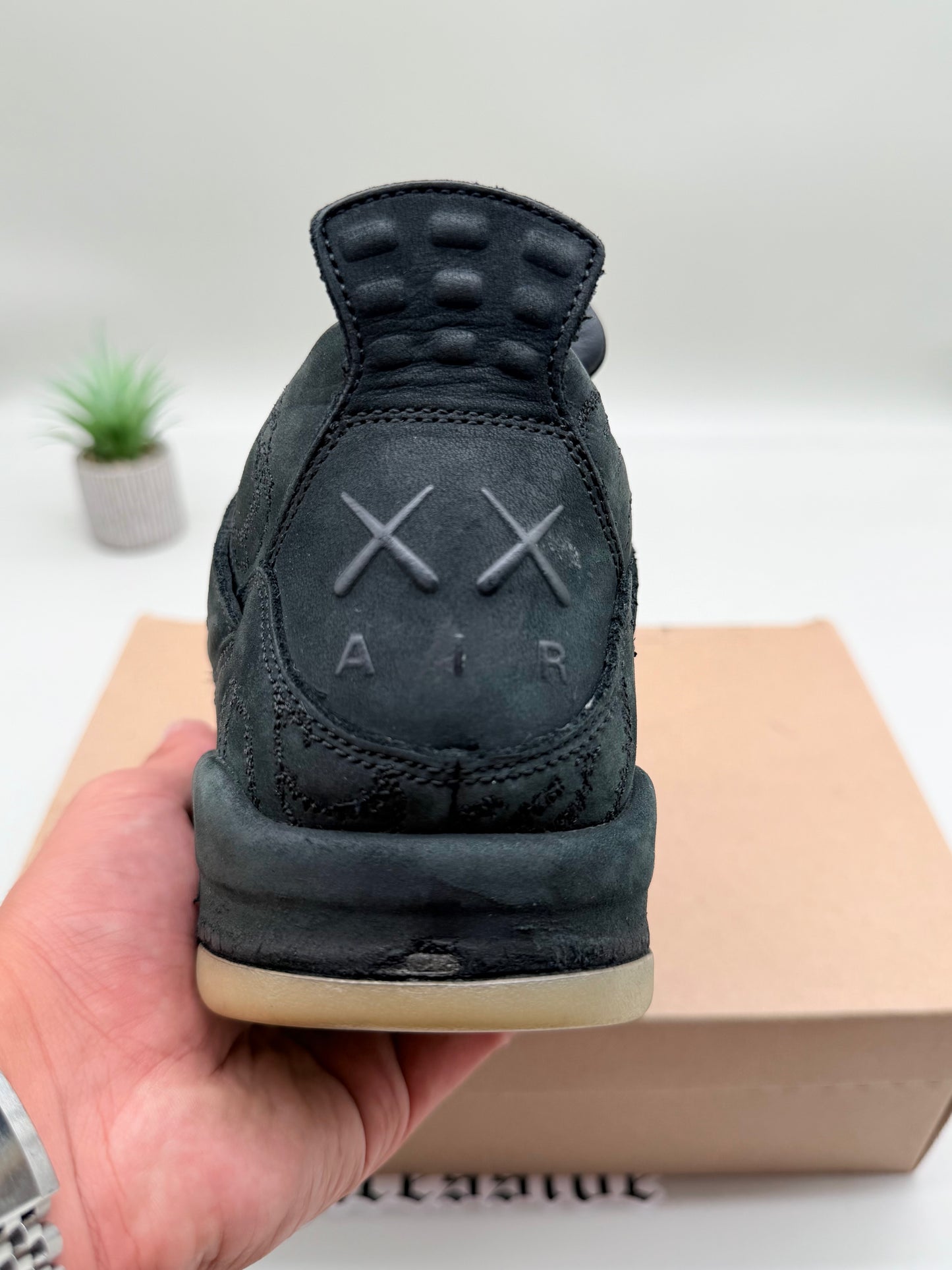 Jordan 4 KAWS Black
